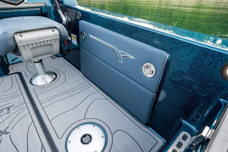 Slide: The Image of 2025 Yar-Craft 210 TFX SP boat interior with sleek seating and modern design. - 18