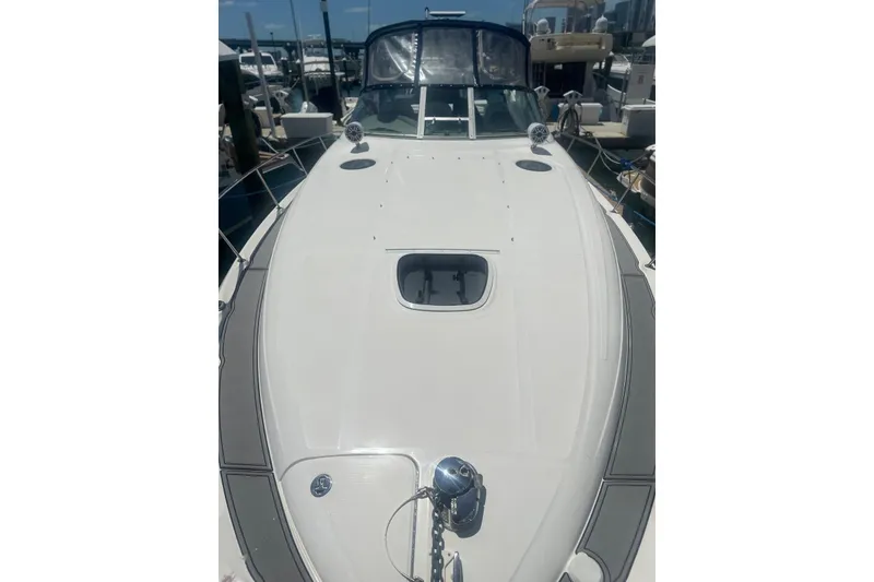 Slide: The Image of 2006 Sea Ray 340 Sundancer yacht docked at marina, viewed from bow. - 15