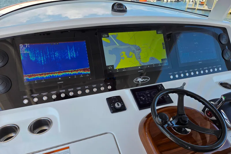 Slide: The Image of 2023 Valhalla Boatworks V-46 dashboard with navigation and sonar displays. - 21