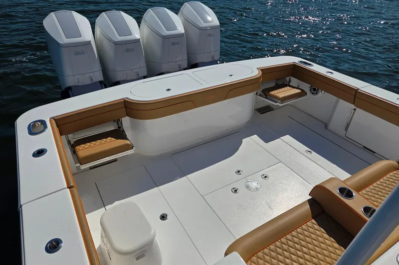 Slide: The Image of 2023 Valhalla Boatworks V-46 with quad engines, luxurious seating, and spacious deck. - 27