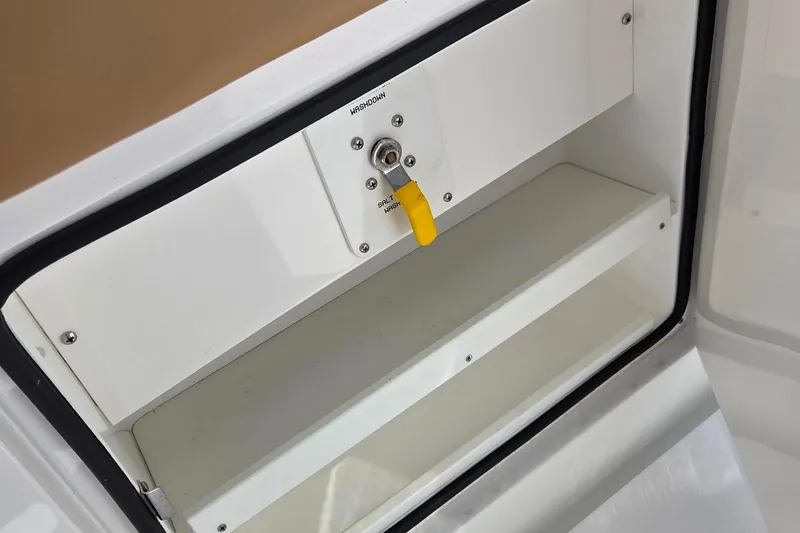 Slide: The Image of 2023 Valhalla Boatworks V-46 storage compartment with washdown control. - 37