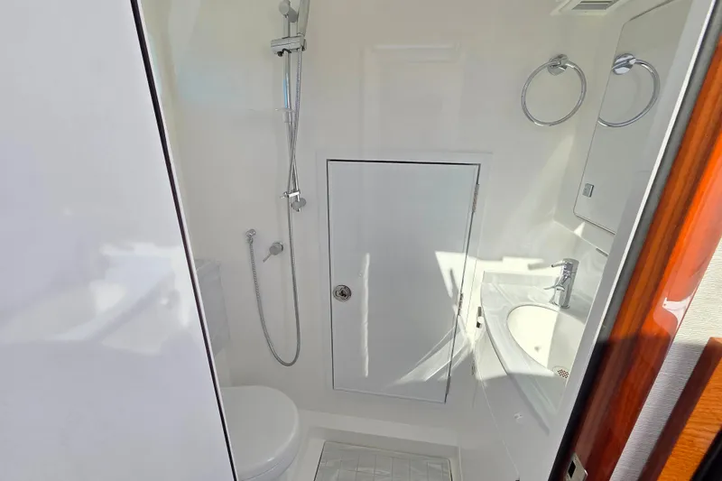 Slide: The Image of 2023 Valhalla Boatworks V-46 bathroom with shower, sink, and modern fixtures. - 40