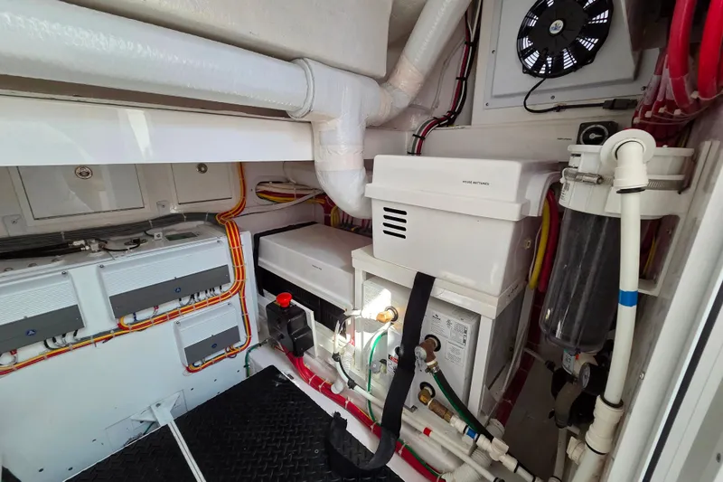 Slide: The Image of Engine room of 2023 Valhalla Boatworks V-46, showcasing wiring and equipment. - 43