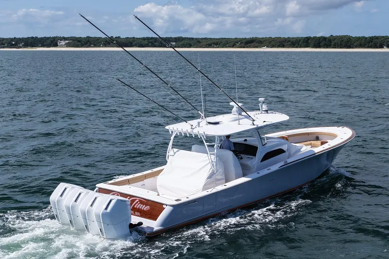 Slide: The Image of 2023 Valhalla Boatworks V-46 cruising on open water with fishing rods. - 6
