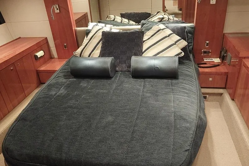 Slide: The Image of Luxurious cabin interior of 2012 Sunseeker Portofino 48 yacht with plush bedding. - 11