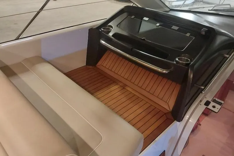 Slide: The Image of Interior of 2012 Sunseeker Portofino 48 yacht with sleek seating and wooden flooring. - 4