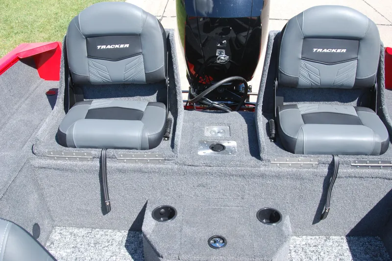 Slide: The Image of 2026 Tracker Pro Guide V-175 Combo boat interior with dual gray seats and motor. - 11