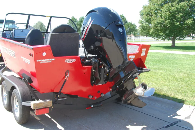 Slide: The Image of 2026 Tracker Pro Guide V-175 Combo boat with Mercury outboard engine on a trailer. - 2