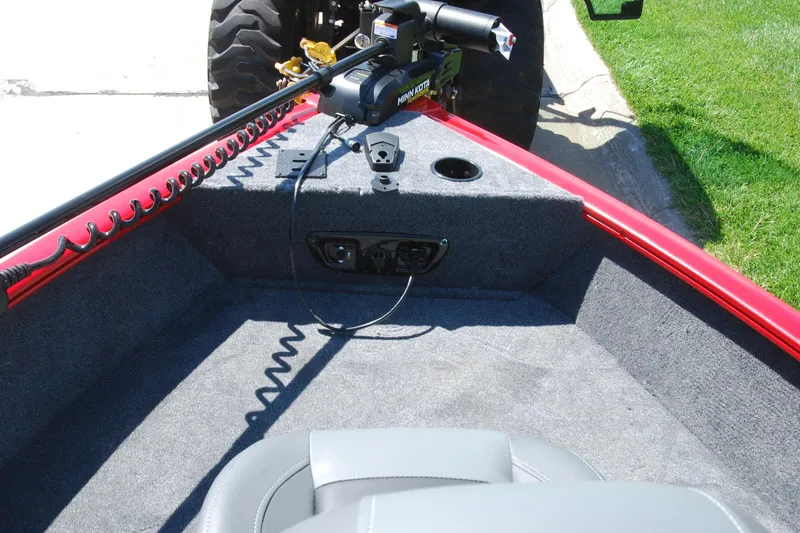 Slide: The Image of 2026 Tracker Pro Guide V-175 Combo boat interior with trolling motor and seating. - 5