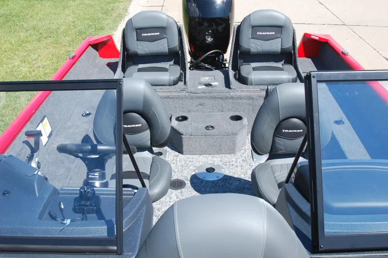 Slide: The Image of 2026 Tracker Pro Guide V-175 Combo boat interior with seating and steering console. - 6