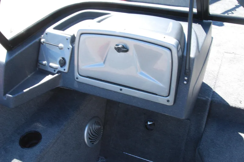 Slide: The Image of 2026 Tracker Pro Guide V-175 Combo boat interior with storage compartment and speaker. - 9