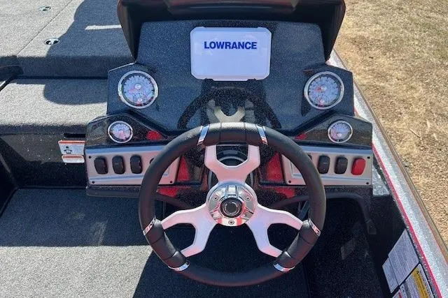 Slide: The Image of Steering console of 2025 Nitro Z19 boat with Lowrance display and gauges. - 13