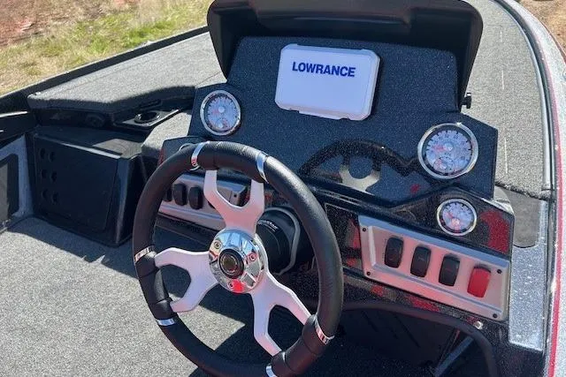 Slide: The Image of Steering console of 2025 Nitro Z19 boat with Lowrance display and gauges. - 14