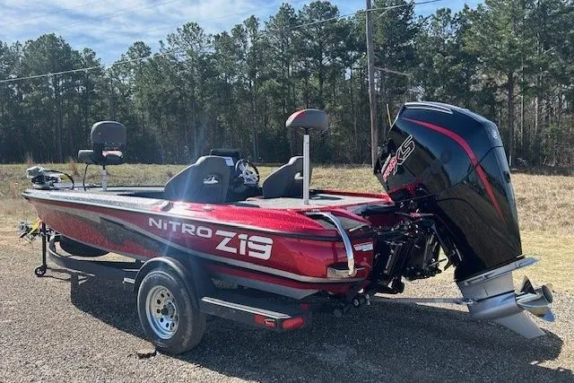 Slide: The Image of 2025 Nitro Z19 boat with powerful engine, parked outdoors on a sunny day. - 4