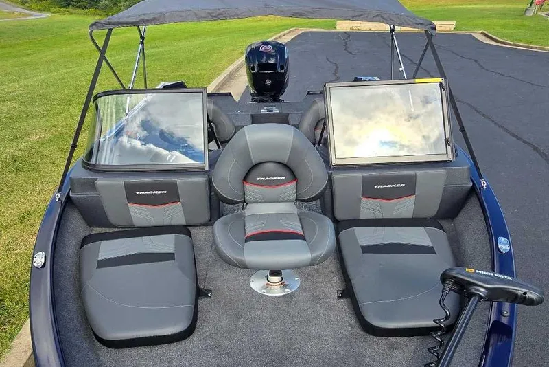 Slide: The Image of 2026 Tracker Pro Guide V-175 Combo boat interior with seating and windshield. - 5