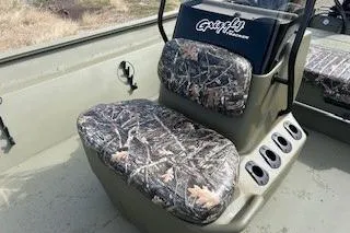 Slide: The Image of 2025 Tracker Grizzly 2072 CC boat seat with camouflage upholstery. - 3