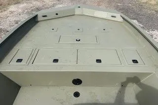 Slide: The Image of 2025 Tracker Grizzly 2072 CC boat deck with storage compartments. - 5