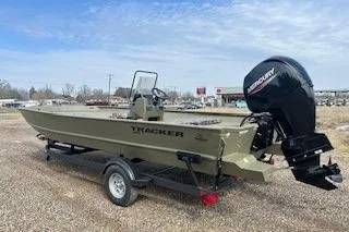 Slide: The Image of 2025 Tracker Grizzly 2072 CC boat on trailer with Mercury outboard motor. - 9