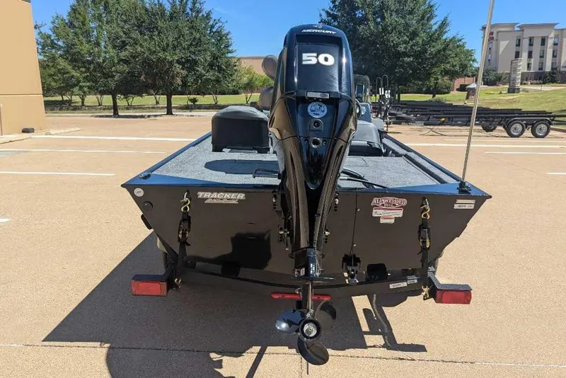 Slide: The Image of 2025 Tracker Bass Tracker Classic XL boat with Mercury 50 engine in parking lot. - 3