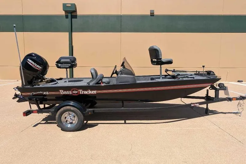 Slide: The Image of 2025 Tracker Bass Tracker Classic XL boat on trailer, side view. - 5