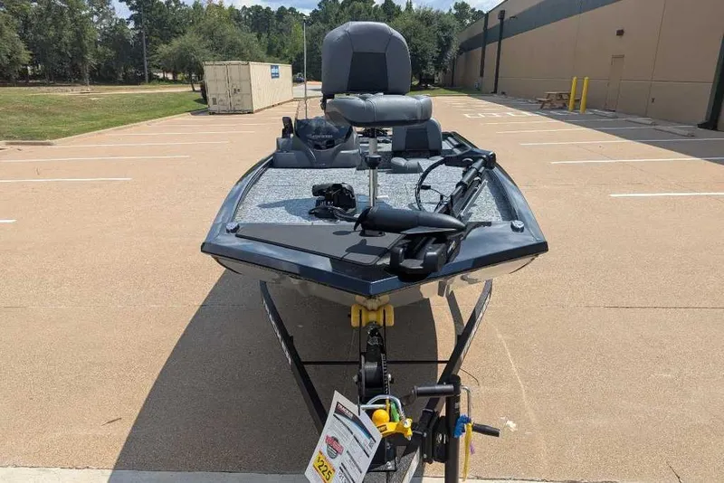 Slide: The Image of 2026 Tracker Pro 170 boat on trailer in parking lot, front view. - 10