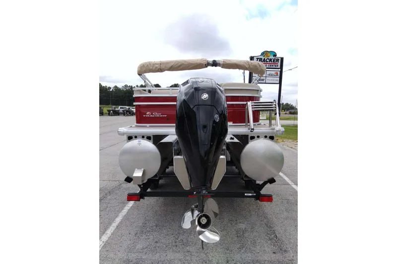 Slide: The Image of 2025 Sun Tracker Party Barge 22 RF XP3 pontoon boat with outboard motor, rear view. - 13
