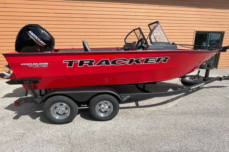 The Image of 2026 Tracker Pro Guide V-175 Combo boat in vibrant red on a trailer. - 0