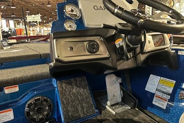 Slide: The Image of 2025 Nitro Z20 XL Pro boat dashboard with steering wheel and controls. - 10