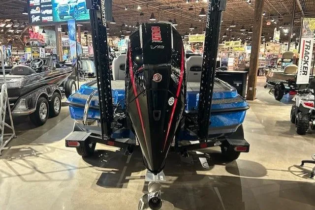 Slide: The Image of 2025 Nitro Z20 XL Pro boat displayed in a showroom with powerful engine. - 12