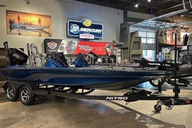 Slide: The Image of 2025 Nitro Z20 XL Pro boat displayed in a showroom with Mercury signage. - 4