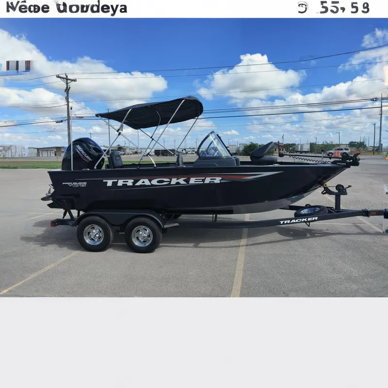 The Image of 2026 Tracker Pro Guide V-175 Combo boat on trailer, parked outdoors under blue sky. - 0