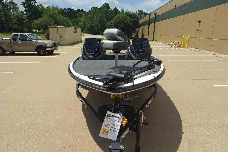 Slide: The Image of 2025 Nitro Z17 boat in parking lot, featuring sleek design and modern equipment. - 5