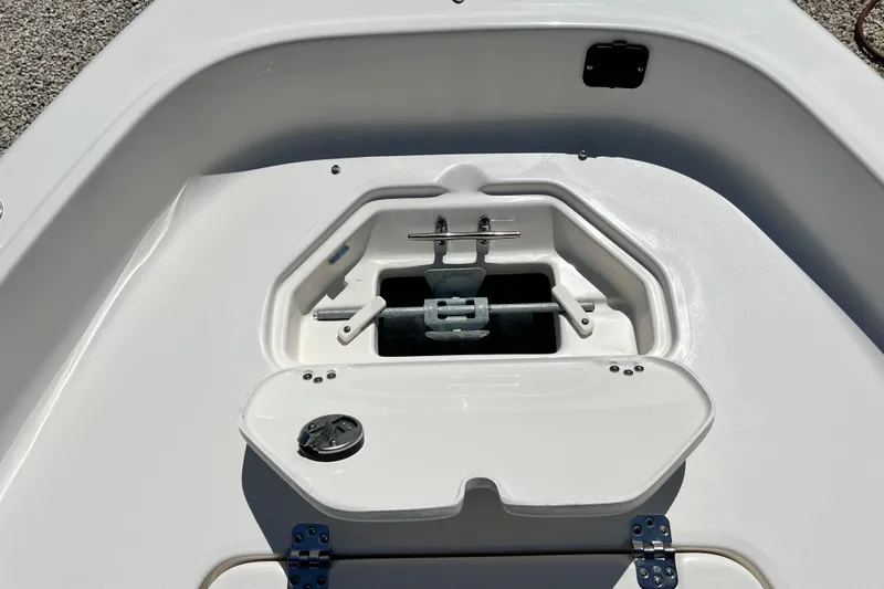 Slide: The Image of 2026 Key West 1720 Center Console boat anchor storage compartment. - 12