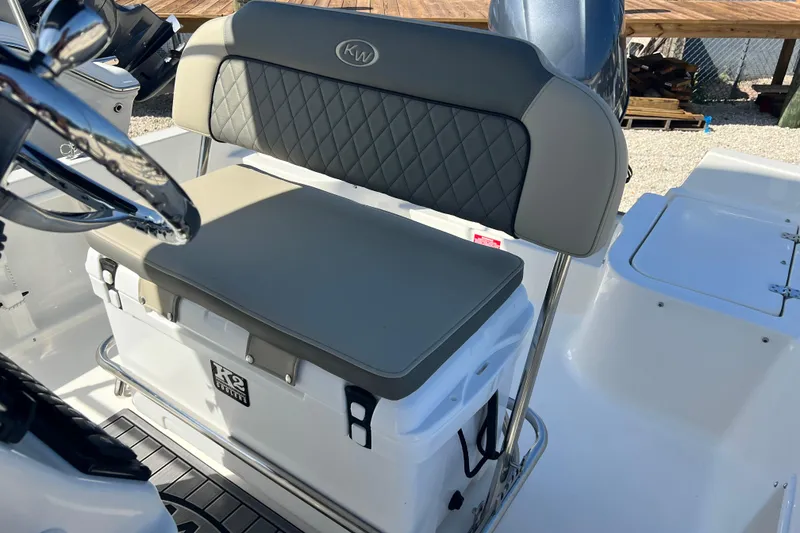 Slide: The Image of 2026 Key West 1720 Center Console boat seat with cooler storage. - 18