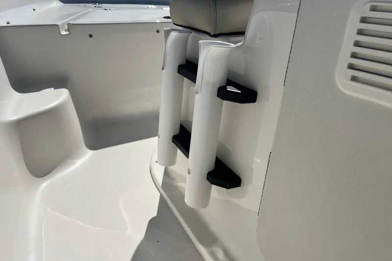 Slide: The Image of 2026 Key West 1720 Center Console boat interior with rod holders. - 26