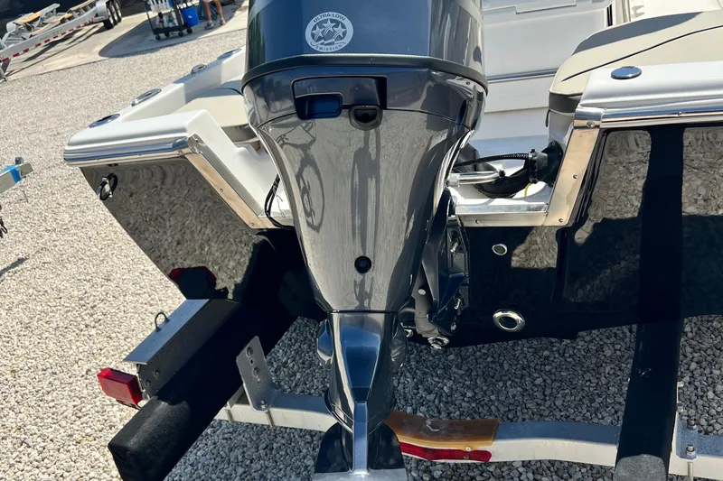 Slide: The Image of 2026 Key West 1720 Center Console boat with outboard motor on a trailer. - 6