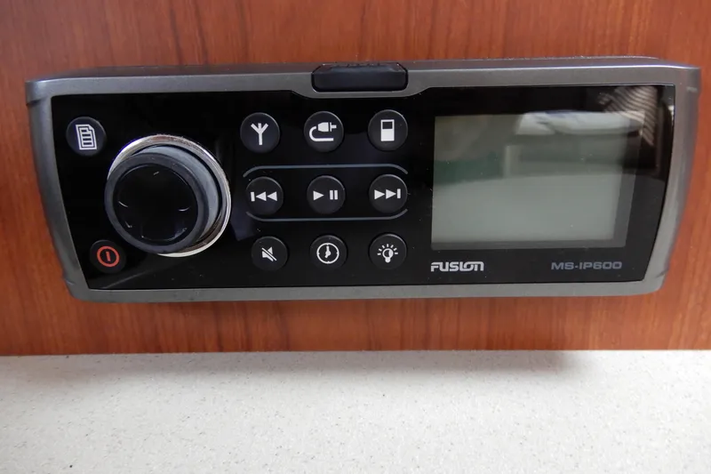 Slide: The Image of Fusion MS-IP600 stereo system on 2002 Chaparral Signature 320 boat dashboard. - 39