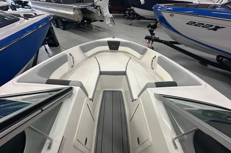 Slide: The Image of 2026 Chaparral 21 SSi boat interior with sleek seating and modern design. - 13
