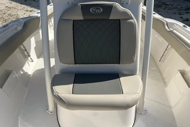 Slide: The Image of 2026 Key West 239 FS boat seat with diamond-patterned upholstery and KW logo. - 12