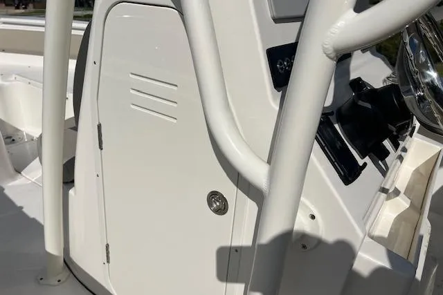 Slide: The Image of 2026 Key West 239 FS boat console with white finish and steering components. - 7
