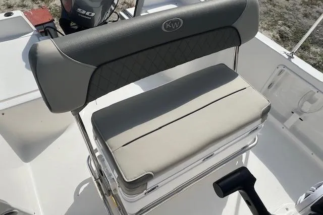 Slide: The Image of 2026 Key West 1720 Center Console boat seat with gray cushioning and KW logo. - 3