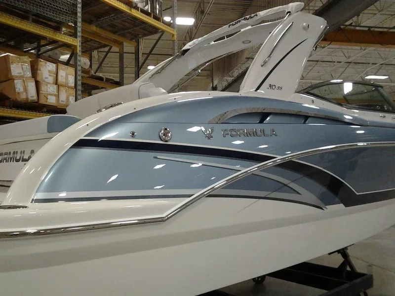 Slide: The Image of Engine compartment of a 2018 Formula 310 Sun Sport boat with Ilmor engine components. - 10