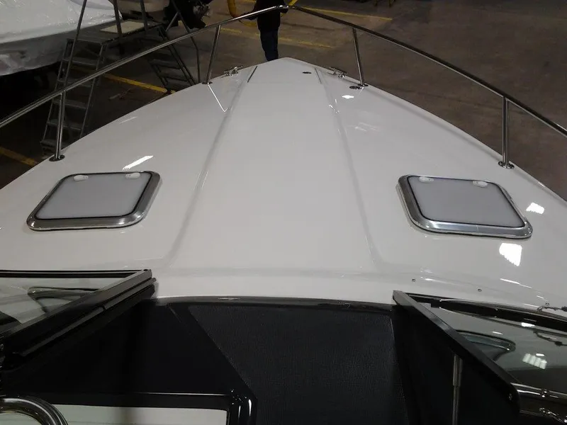 Slide: The Image of 2018 Formula 310 Sun Sport dashboard with steering wheel and gauges. - 15