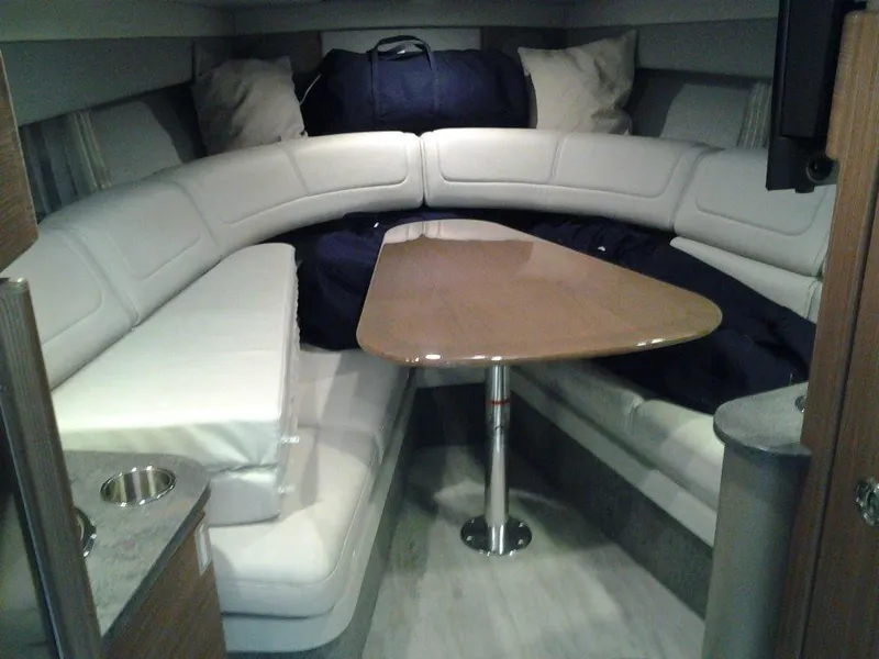 Slide: The Image of 2018 Formula 310 Sun Sport boat interior with kitchenette and storage. - 19