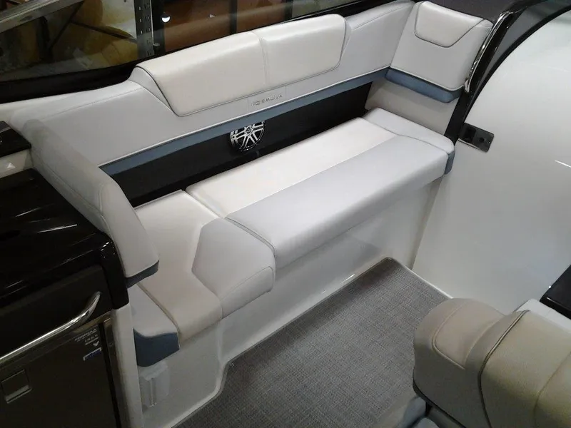 Slide: The Image of 2018 Formula 310 Sun Sport boat interior with plush seating and modern dashboard. - 28