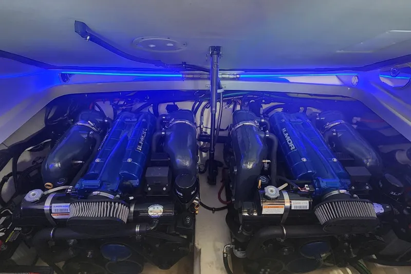 Slide: The Image of 2018 Formula 310 Sun Sport boat with sleek design, docked outdoors. - 6