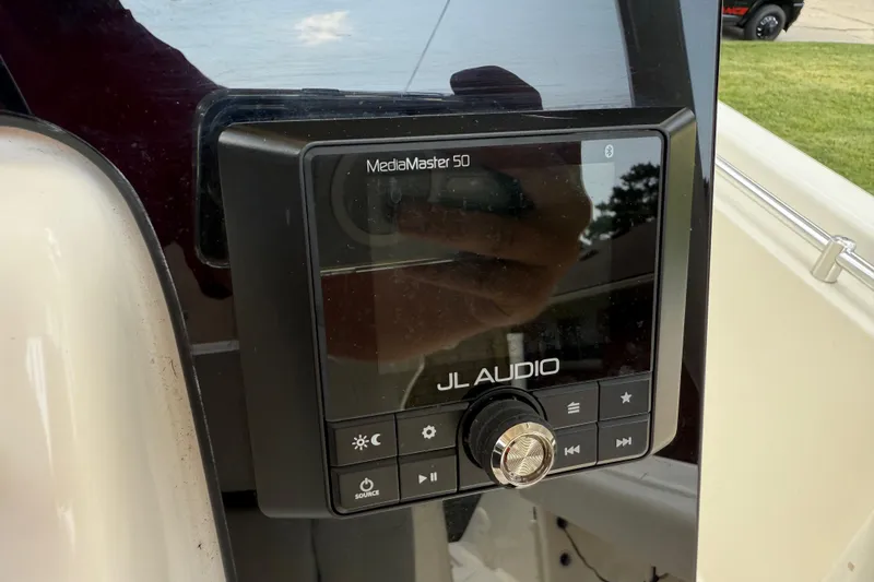 Slide: The Image of JL Audio MediaMaster 50 on 2020 Cobia 220 Center Console boat. - 15