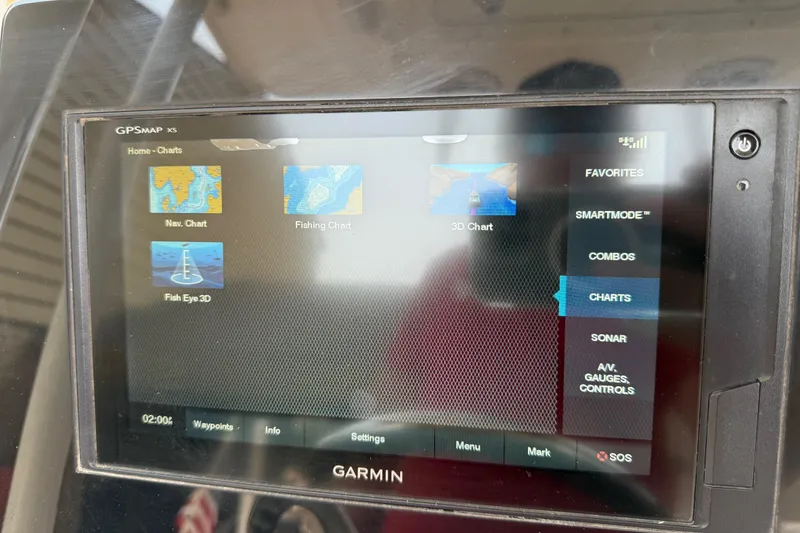 Slide: The Image of Garmin GPS display on 2020 Cobia 220 Center Console boat showing navigation charts. - 17