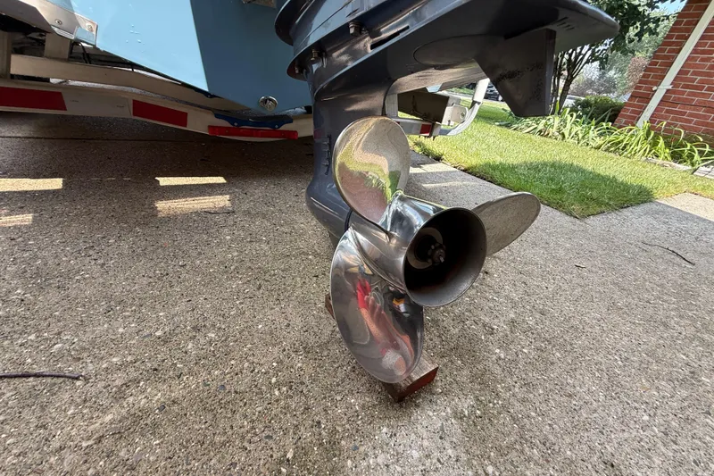 Slide: The Image of Propeller of a 2020 Cobia 220 Center Console boat on a trailer. - 7