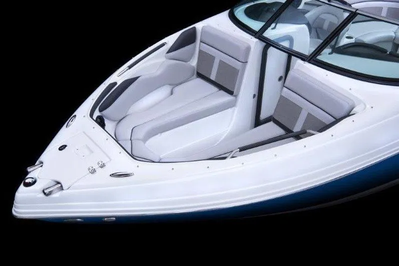 Slide: The Image of Manufacturer Provided Image: 2018 Rinker QX26 BR boat interior with white and gray seating. - 24
